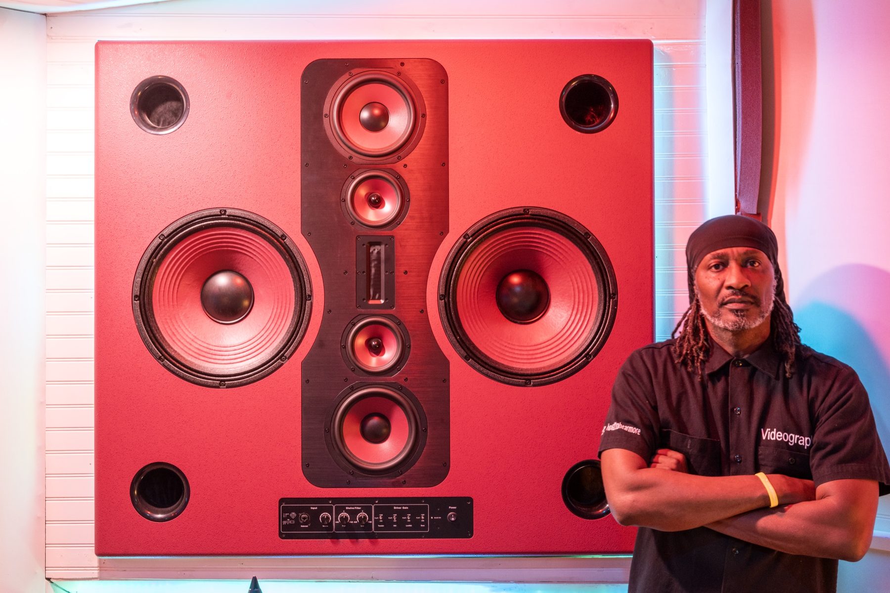 Studio owner with his speaker wall