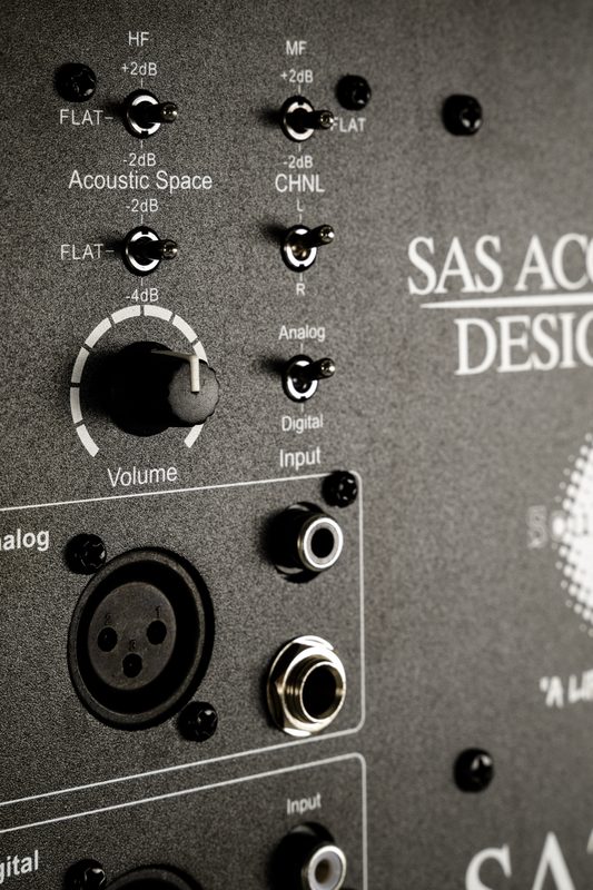 Close-up of SAS Acoustics monitor controls and inputs